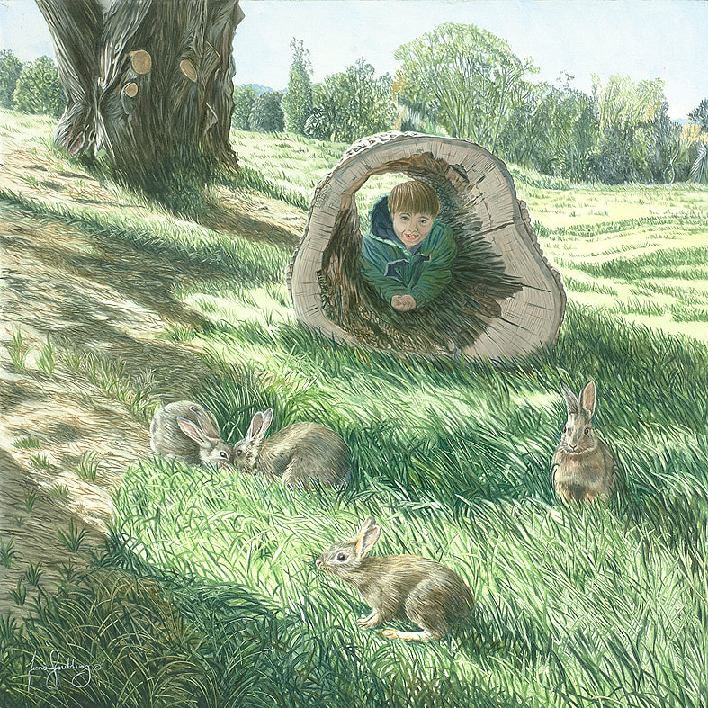 A young boy watches rabbits play hidden from view in a hollow log.